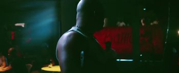 Movie still from “Little Dragon - Pretty Girls” (2014), directed by Nabil Elderkin – Medium shot, Low angle