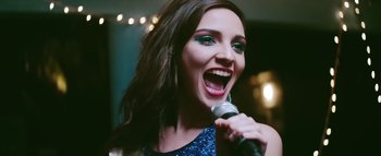 Movie still from “Little Dragon - Pretty Girls” (2014), directed by Nabil Elderkin – Close Up shot, Low angle