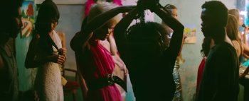 Movie still from “Little Dragon - Pretty Girls” (2014), directed by Nabil Elderkin – Medium shot, Low angle