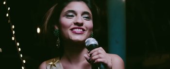 Movie still from “Little Dragon - Pretty Girls” (2014), directed by Nabil Elderkin – Close Up shot, Low angle