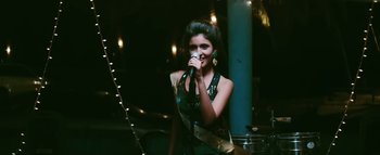 Movie still from “Little Dragon - Pretty Girls” (2014), directed by Nabil Elderkin – Close Up shot, Low angle