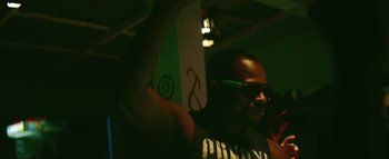 Movie still from “Little Dragon - Pretty Girls” (2014), directed by Nabil Elderkin – Medium shot, Low angle