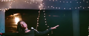 Movie still from “Little Dragon - Pretty Girls” (2014), directed by Nabil Elderkin – Medium shot, Low angle