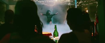 Movie still from “Little Dragon - Pretty Girls” (2014), directed by Nabil Elderkin – Medium shot, Low angle