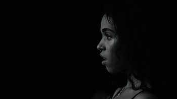 Movie still from “FKA Twigs - Video Girl” (2014), directed by Kahlil Joseph – Close Up shot, High angle