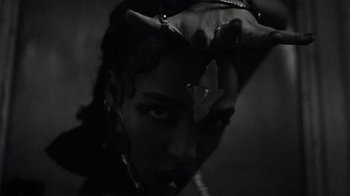 Movie still from “FKA Twigs - Video Girl” (2014), directed by Kahlil Joseph – Extreme Close Up shot, Overhead angle
