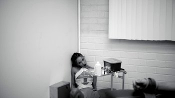 Movie still from “FKA Twigs - Video Girl” (2014), directed by Kahlil Joseph – Medium shot, High angle