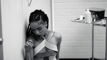 Movie still from “FKA Twigs - Video Girl” (2014), directed by Kahlil Joseph – Medium shot, High angle