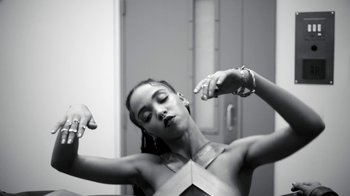 Movie still from “FKA Twigs - Video Girl” (2014), directed by Kahlil Joseph – Medium shot, Low angle