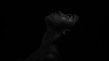 Movie still from “FKA Twigs - Video Girl” (2014), directed by Kahlil Joseph – Extreme Close Up shot, Low angle