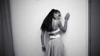 Movie still from “FKA Twigs - Video Girl” (2014), directed by Kahlil Joseph – Medium shot, Low angle