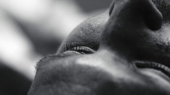 Movie still from “FKA Twigs - Video Girl” (2014), directed by Kahlil Joseph – Extreme Close Up shot, Low angle