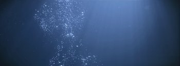 Movie still from “Dels - Burning Beaches” (2014), directed by Us – Extreme Wide shot, Low angle