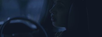 Movie still from “Dels - Burning Beaches” (2014), directed by Us – Close Up shot, Low angle