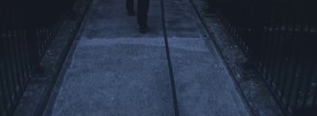 Movie still from “Dels - Burning Beaches” (2014), directed by Us – Wide shot, Overhead angle