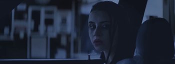 Movie still from “Dels - Burning Beaches” (2014), directed by Us – Close Up shot, Low angle