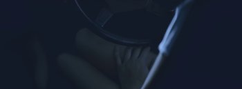 Movie still from “Dels - Burning Beaches” (2014), directed by Us – Extreme Close Up shot, Overhead angle