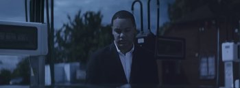 Movie still from “Dels - Burning Beaches” (2014), directed by Us – Medium shot, Low angle