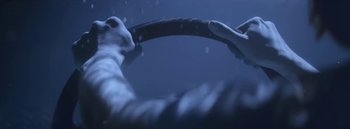 Movie still from “Dels - Burning Beaches” (2014), directed by Us – Extreme Close Up shot, Low angle