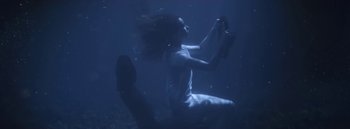 Movie still from “Dels - Burning Beaches” (2014), directed by Us – Wide shot, Low angle