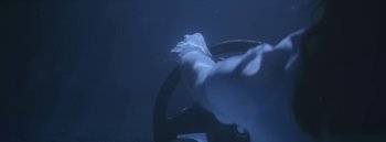 Movie still from “Dels - Burning Beaches” (2014), directed by Us – Extreme Close Up shot, High angle