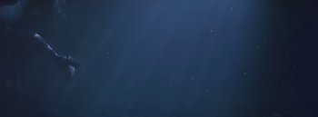 Movie still from “Dels - Burning Beaches” (2014), directed by Us – Medium shot, Low angle