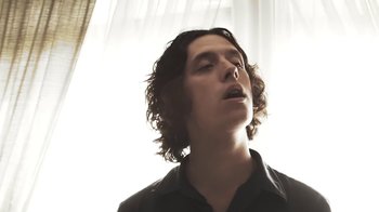 Movie still from “Natas Loves You - Got To Belong” (2014), directed by Larry Clark – Close Up shot, Low angle