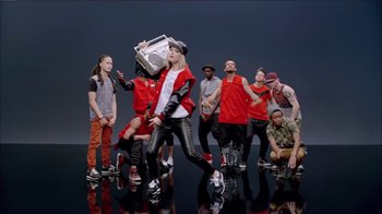 Movie still from “Taylor Swift - Shake It Off” (2014), directed by Mark Romanek – Wide shot, Low angle