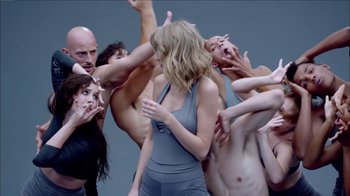 Movie still from “Taylor Swift - Shake It Off” (2014), directed by Mark Romanek – Medium shot, Over the shoulder angle