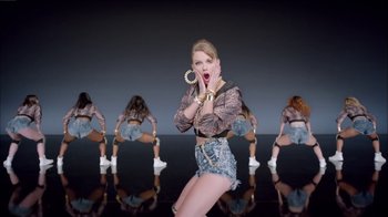 Movie still from “Taylor Swift - Shake It Off” (2014), directed by Mark Romanek – Medium shot, Over the shoulder angle