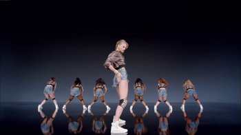 Movie still from “Taylor Swift - Shake It Off” (2014), directed by Mark Romanek – Wide shot, Low angle
