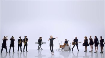 Movie still from “Taylor Swift - Shake It Off” (2014), directed by Mark Romanek – Wide shot, Low angle