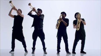 Movie still from “Taylor Swift - Shake It Off” (2014), directed by Mark Romanek – Wide shot, Low angle