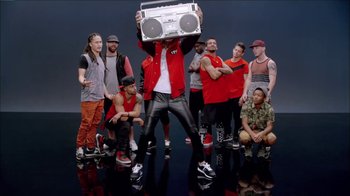 Movie still from “Taylor Swift - Shake It Off” (2014), directed by Mark Romanek – Wide shot, Low angle