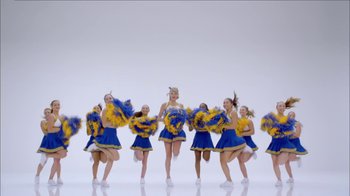 Movie still from “Taylor Swift - Shake It Off” (2014), directed by Mark Romanek – Wide shot, Low angle