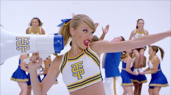 Movie still from “Taylor Swift - Shake It Off” (2014), directed by Mark Romanek – Medium shot, Over the shoulder angle