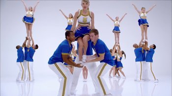Movie still from “Taylor Swift - Shake It Off” (2014), directed by Mark Romanek – Wide shot, Low angle