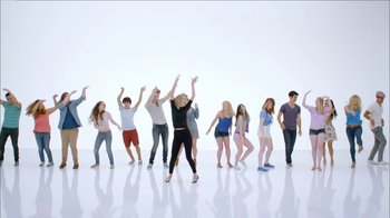 Movie still from “Taylor Swift - Shake It Off” (2014), directed by Mark Romanek – Wide shot, Low angle