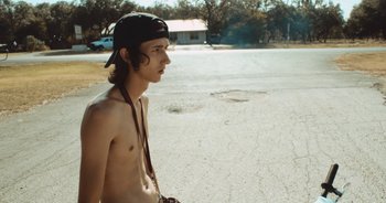 Movie still from “Alt-J - Left Hand Free” (2014), directed by Ryan Staake – Medium shot, Over the shoulder angle