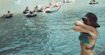 Movie still from “Alt-J - Left Hand Free” (2014), directed by Ryan Staake – Medium shot, High angle