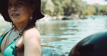 Movie still from “Alt-J - Left Hand Free” (2014), directed by Ryan Staake – Close Up shot, High angle