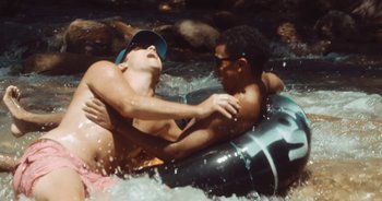 Movie still from “Alt-J - Left Hand Free” (2014), directed by Ryan Staake – Medium shot, High angle