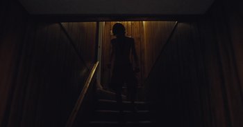 Movie still from “Alt-J - Left Hand Free” (2014), directed by Ryan Staake – Medium shot, Low angle