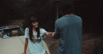 Movie still from “Alt-J - Left Hand Free” (2014), directed by Ryan Staake – Medium shot, Over the shoulder angle