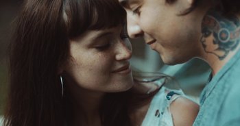 Movie still from “Alt-J - Left Hand Free” (2014), directed by Ryan Staake – Close Up shot, Over the shoulder angle