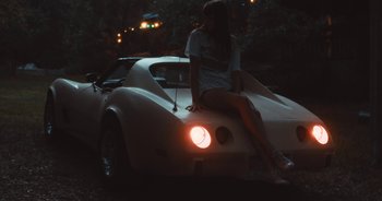 Movie still from “Alt-J - Left Hand Free” (2014), directed by Ryan Staake – Medium shot, High angle