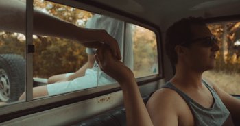 Movie still from “Alt-J - Left Hand Free” (2014), directed by Ryan Staake – Close Up shot, Over the shoulder angle