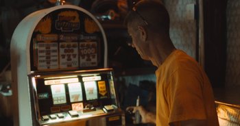 Movie still from “Alt-J - Left Hand Free” (2014), directed by Ryan Staake – Close Up shot, Over the shoulder angle