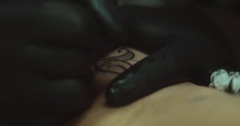 Movie still from “Alt-J - Left Hand Free” (2014), directed by Ryan Staake – Extreme Close Up shot, Overhead angle