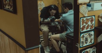 Movie still from “Alt-J - Left Hand Free” (2014), directed by Ryan Staake – Medium shot, High angle